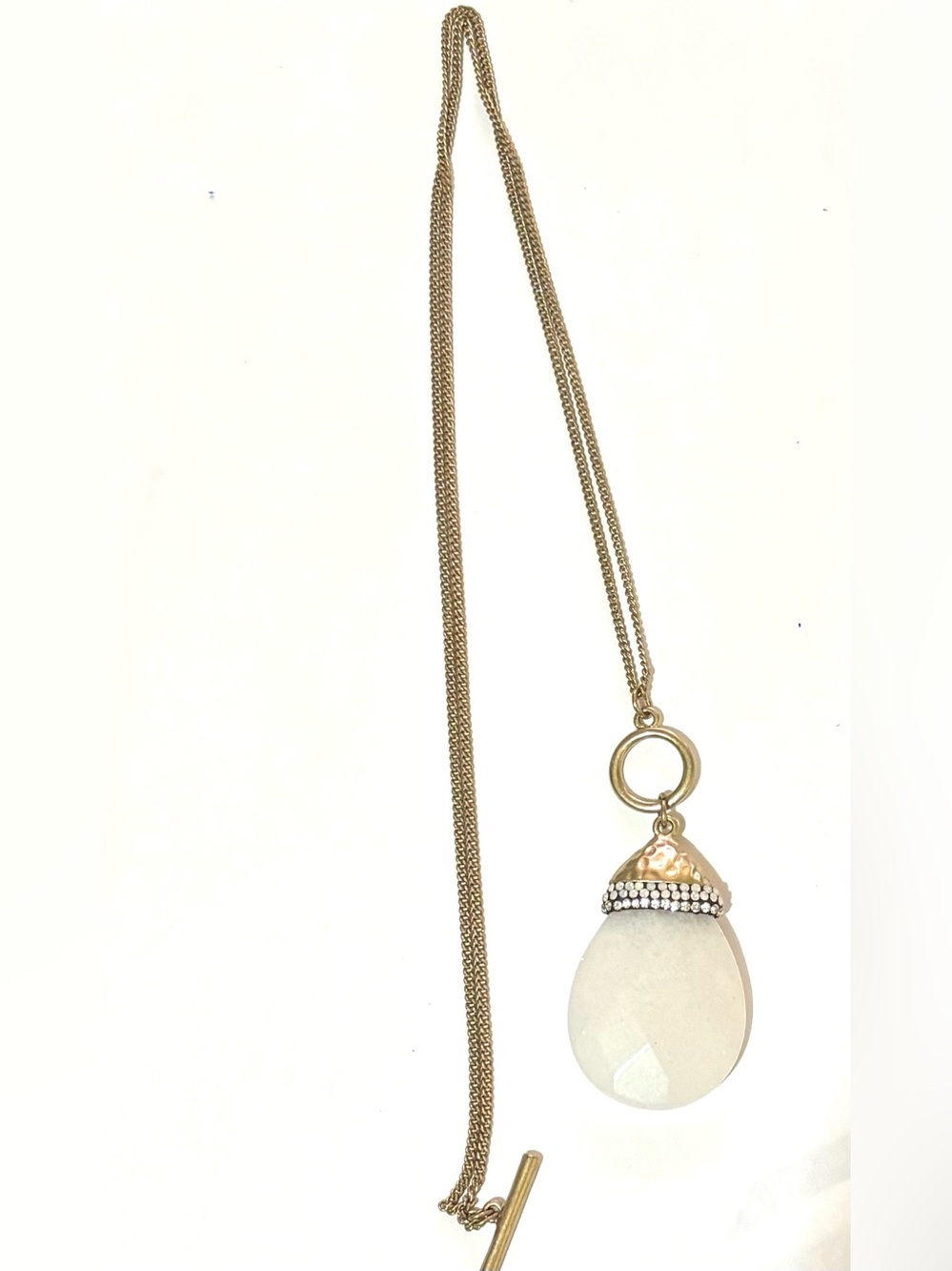 Gold-Tone Pendant Necklace with White Teardrop Stone